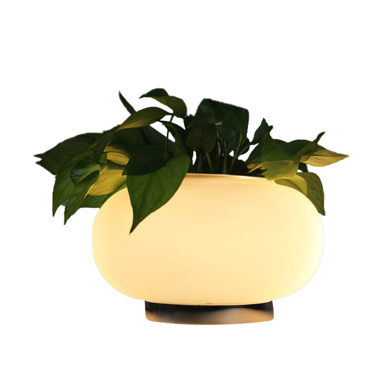 Lampada da tavolo ovale in vetro bianco stile industriale luce LED da comodino con accento di pianta