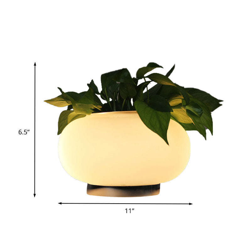 Lampada da tavolo ovale in vetro bianco stile industriale luce LED da comodino con accento di pianta